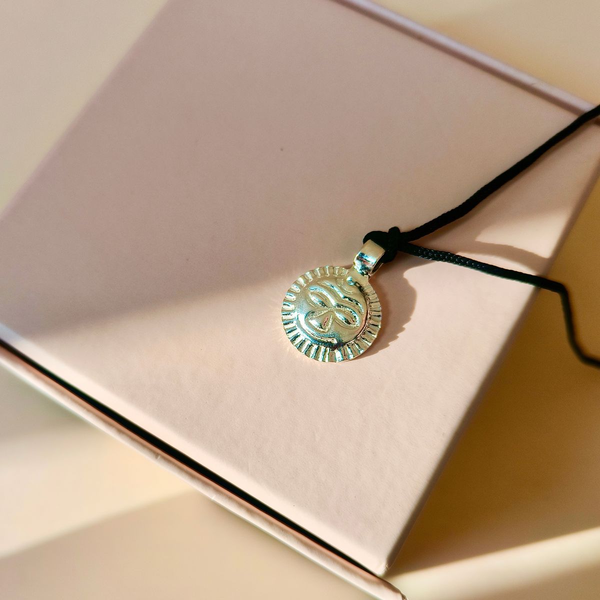 Surya Pendant Made in Pure Silver with Free Black Cord